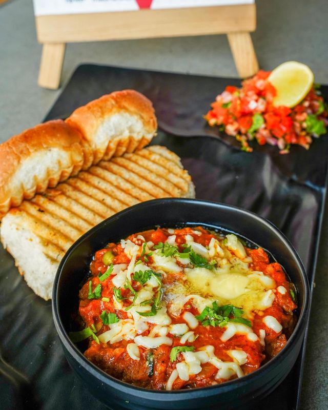 Cheese Pav Bhaji loaded with grated cheese and butter