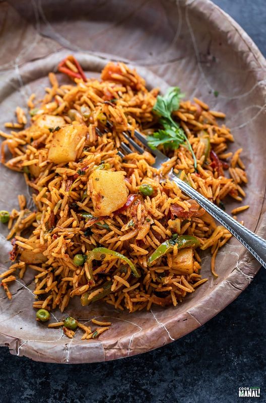 Tawa pulao tossed on the hot tawa